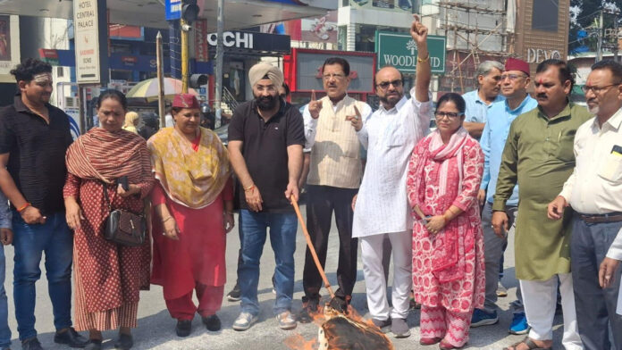 Government effigy in protest against paper leak